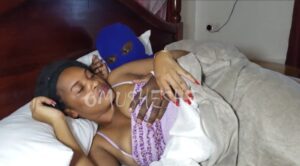 Omusheshe.with her boyfriend in bed